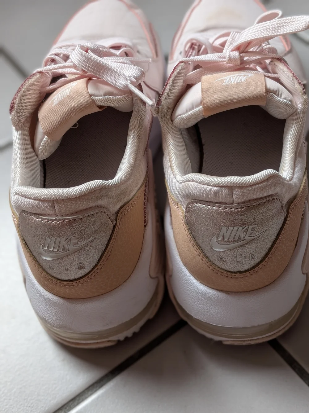 Nike Women’s Sneakers in Blush with Metallic Rose Accent